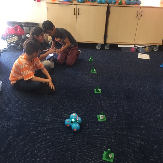 Our team of future computer scientists work on hands-on projects with Sphero and Clash Robots!