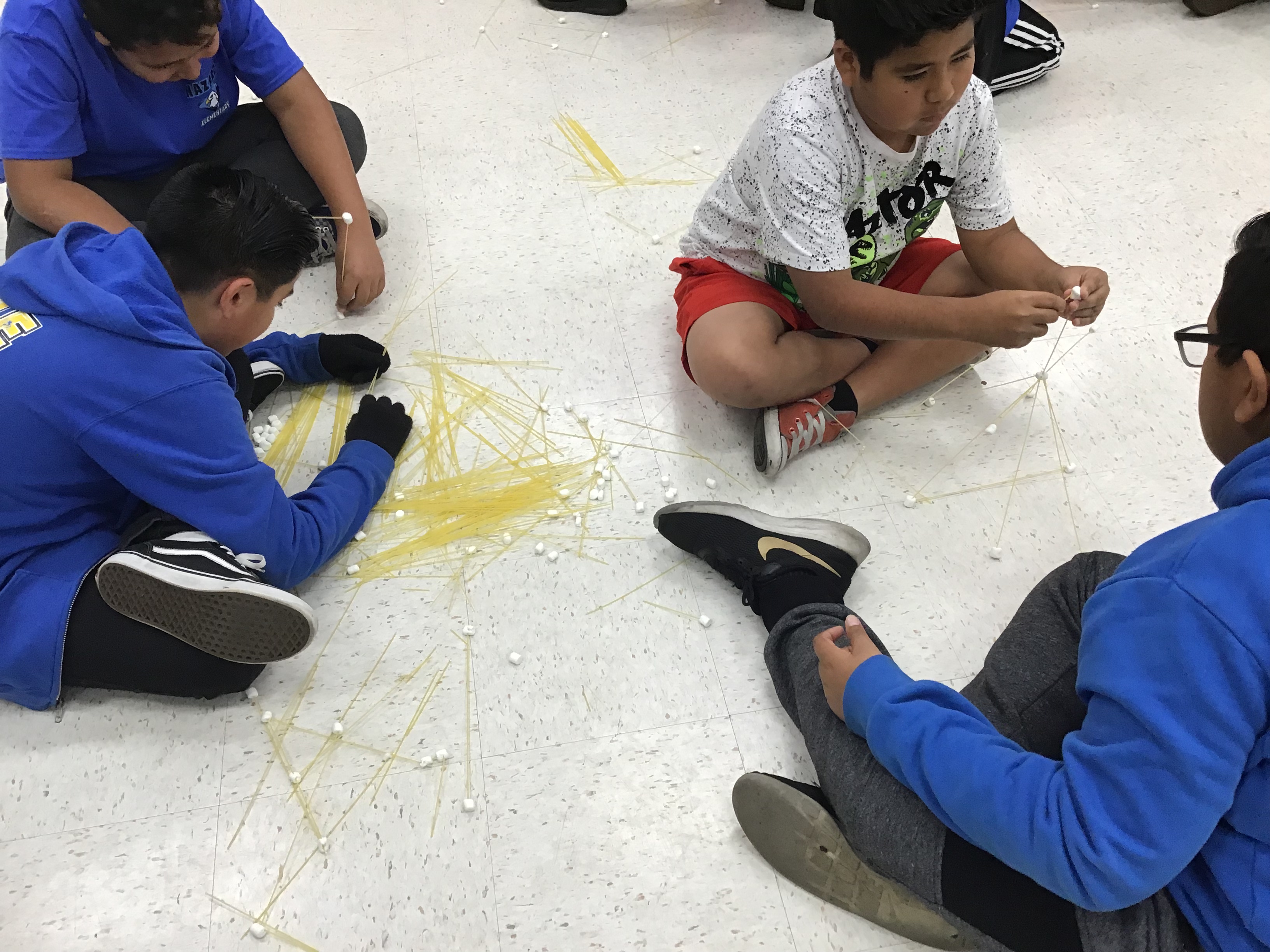 6th Grade students engaging in STEAM activities