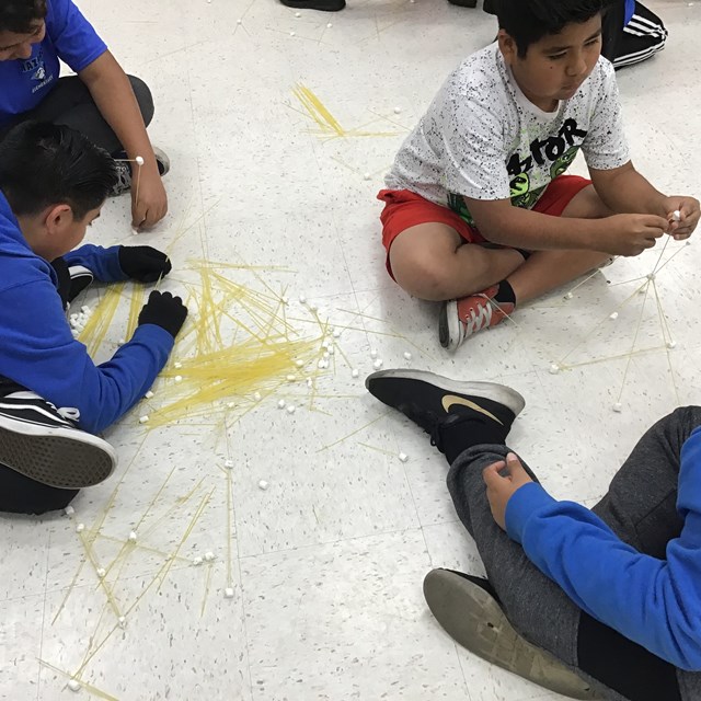6th Grade students engaging in STEAM activities