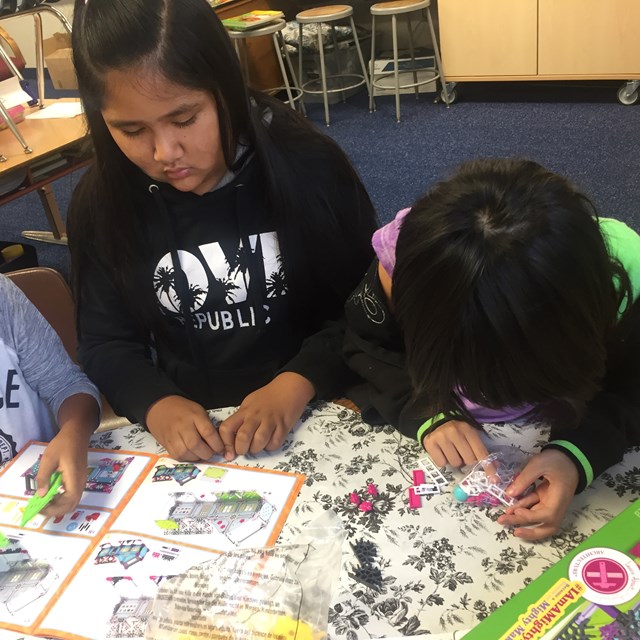 Teachers and staff ensure that students learn how to cooperate when working in groups.