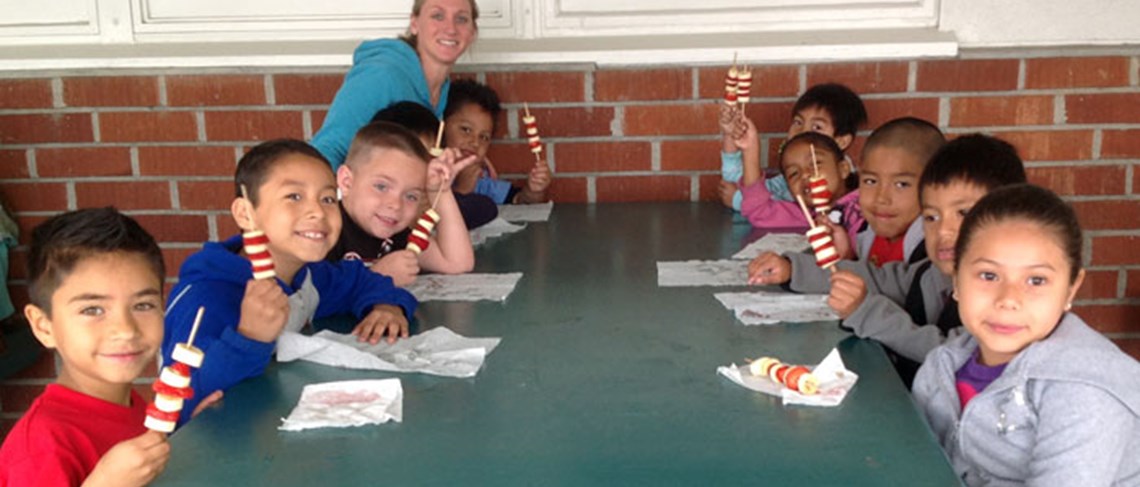Students having a snack break during their activity.