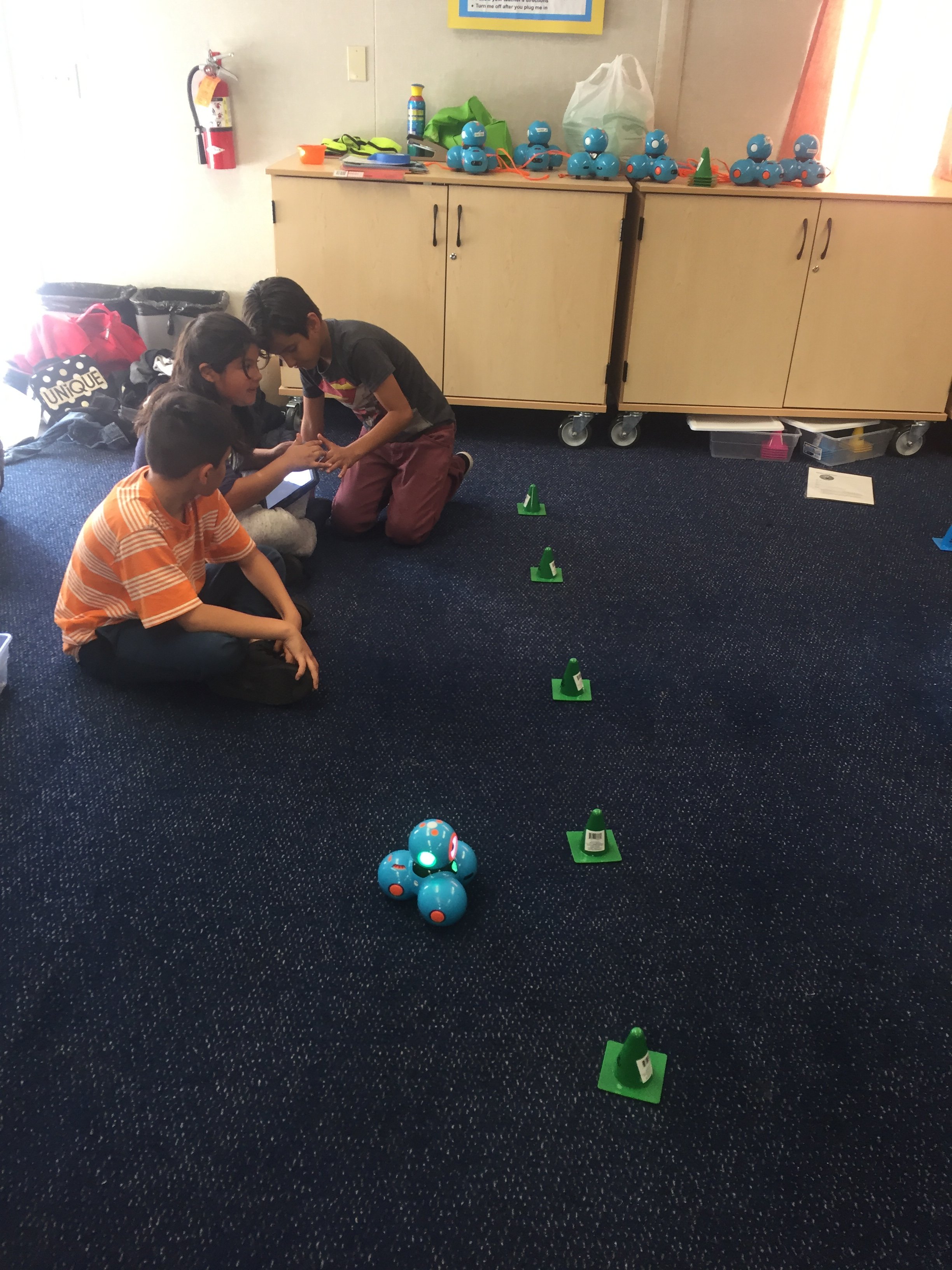 Our team of future computer scientists work on hands-on projects with Sphero and Clash Robots!