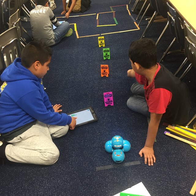 These two gentlemen are stepping things up a notch by creating a tricky set of obstacles their robot must overcome!